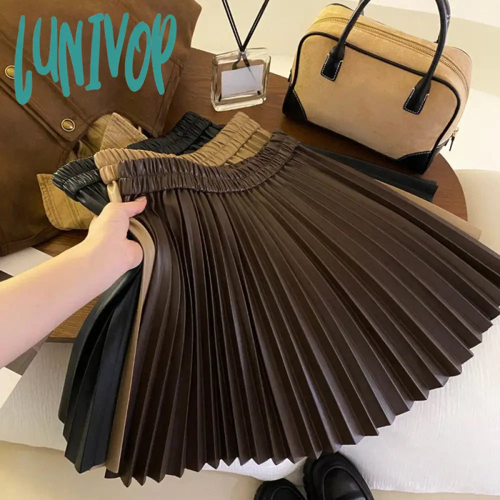 Lunivop PU Leather Pleated Skirt Women New Arrival High Waist Mini Skirts Female Solid Color A Line Faldas Mujer Casual Loose Bottoms Vintage Pleated Skirt